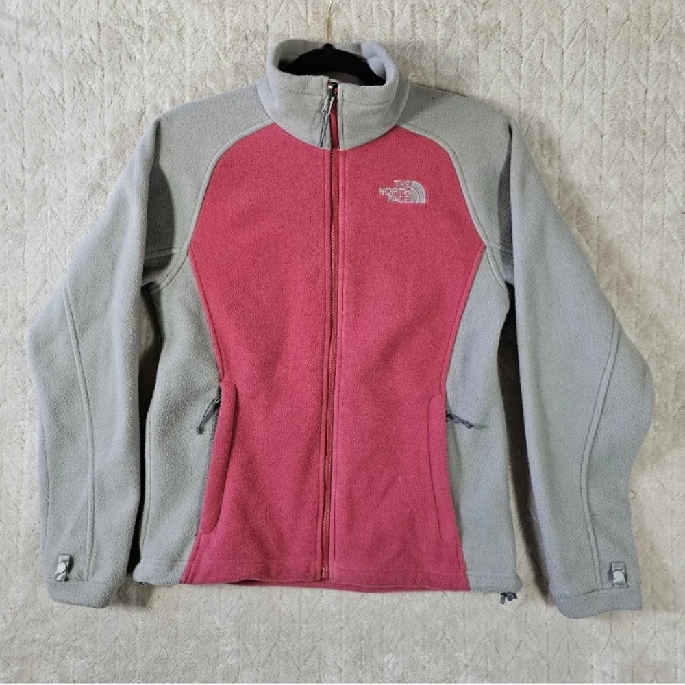 The North Face pink and gray zip up sweatshirt in good used condition.